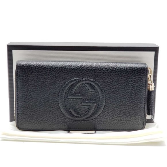 Gucci Handbags - Authentic Gucci GG Black Zippy Wallet New